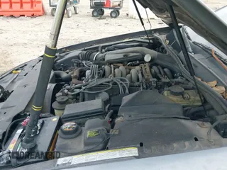 ✅ 1996 Lincoln Mark VIII • VIN: 1LNLM91V5TY647415 • Lot: 41761442. Listed on IAAI with 222,004 mi. Free auction sales archive from the USA and detailed vehicle history report at DreamBid. Image 20.