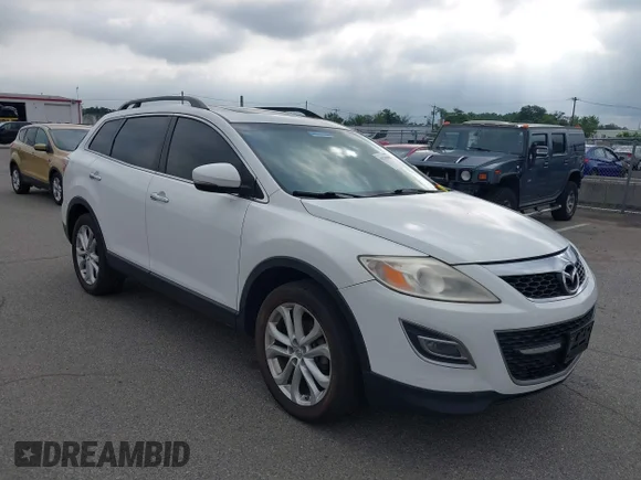 ✅ 2011 Mazda CX-9 Grand Touring • VIN: JM3TB3DV8B0325715 • Лот: 42710081. Опубліковано раніше на IAAI з пробігом 127 196 миль. Безкоштовний доступ до архіву аукціонних продажів зі США та докладний звіт про історію автомобіля на DreamBid. Зображення 1.