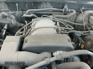 ✅ 2002 Toyota Tundra SR5 • VIN: 5TBRT34112S285190 • Lot: 42606033. Listed on IAAI with 220,865 mi. Free auction sales archive from the USA and detailed vehicle history report at DreamBid. Image 12.