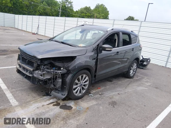 ✅ 2017 Ford Escape Titanium • VIN: 1FMCU0JD2HUB73781 • Lot: 45149959. Wystawiony na IAAI z przebiegiem 126 969 mil. Bezpłatny archiwum sprzedaży aukcyjnych z USA i szczegółowy raport historii pojazdu na DreamBid. Zdjęcie 2.