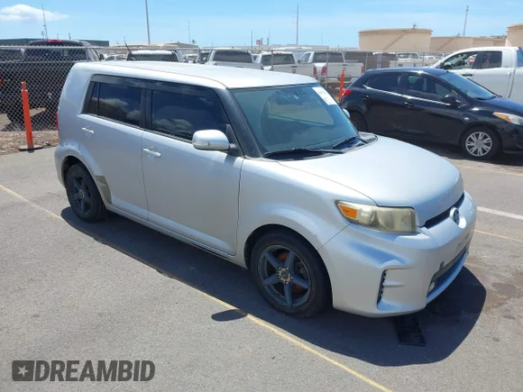 ✅ 2012 Scion xB • VIN: JTLZE4FE4CJ025733 • Lot: 43012013. Listed on IAAI with 126,992 mi. Free auction sales archive from the USA and detailed vehicle history report at DreamBid. Image 1.