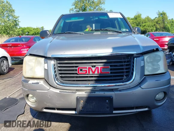 ✅ 2002 GMC Envoy SLT • VIN: 1GKDT13S022105824 • Lot: 45043424. Wystawiony na IAAI z przebiegiem 148 828 mil. Bezpłatny archiwum sprzedaży aukcyjnych z USA i szczegółowy raport historii pojazdu na DreamBid. Zdjęcie 6.