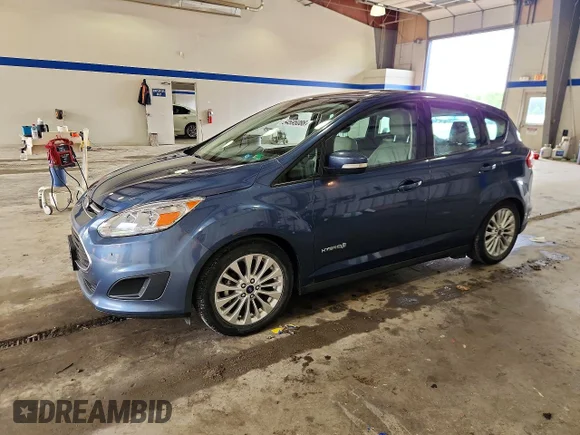 ✅ 2018 Ford C-Max SE • VIN: 1FADP5AU0JL104019 • Lot: 54595086. Listed on Copart with 70,134 mi. Free auction sales archive from the USA and detailed vehicle history report at DreamBid. Image 1.