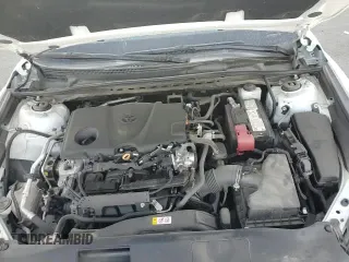 2021 Toyota Camry LE z VIN 4T1C11BK9MU044104, wystawiony jako Copart lot #82030915 z przebiegiem 51 409 mil mil oraz Szkoda całkowita • Salvage title. Historia ofert i sprzedaży dostępna na DreamBid. Obrazek 14.