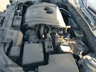 ✅ 2014 Mazda 3 S Grand Touring • VIN: JM1BM1W33E1210937 • Лот: 42747125. Опубликован ранее на IAAI с пробегом 110 205 миль. Бесплатный доступ к архиву аукционных продаж из США и подробный отчёт об истории автомобиля на DreamBid. Изображение 20.