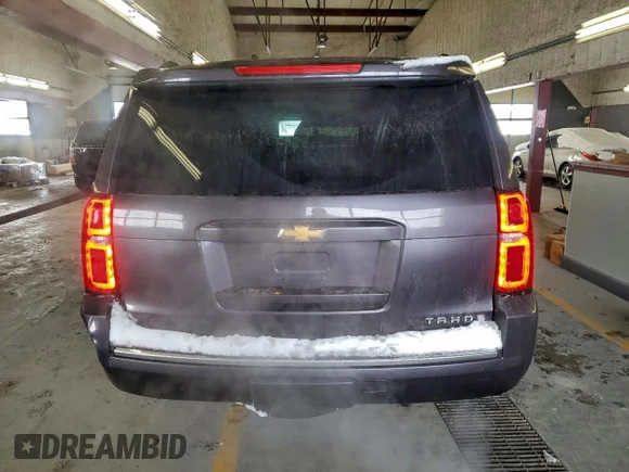 ✅ 2015 Chevrolet Tahoe LTZ • VIN: 1GNSKCKC7FR175787 • Lot: 95343325. Wystawiony na Copart z przebiegiem 157 974 mil. Bezpłatny archiwum sprzedaży aukcyjnych z USA i szczegółowy raport historii pojazdu na DreamBid. Zdjęcie 6.