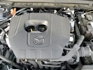 ✅ 2024 Mazda CX-30 S Premium • VIN: 3MVDMBDM2RM620260 • Лот: 85313544. Опубликован ранее на Copart с пробегом 6 877 миль. Бесплатный доступ к архиву аукционных продаж из США и подробный отчёт об истории автомобиля на DreamBid. Изображение 13.