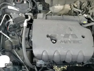 2019 Mitsubishi Outlander ES z VIN JA4AD2A34KZ055234, wystawiony jako Copart lot #86810555 z przebiegiem 127 638 mil mil oraz Czysty tytuł • Clean title. Historia ofert i sprzedaży dostępna na DreamBid. Obrazek 13.