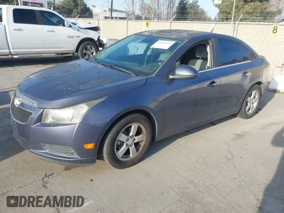 ✅ 2014 Chevrolet Cruze 1LT • VIN: 1G1PC5SB1E7444996 • Lot: 44339154. Listed on IAAI with 162,711 mi. Free auction sales archive from the USA and detailed vehicle history report at DreamBid. Image 2.