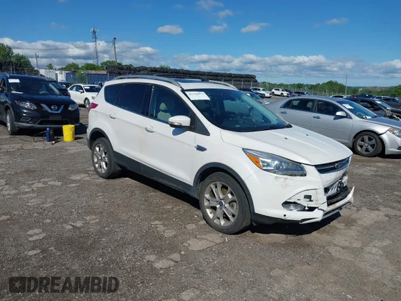 ✅ 2015 Ford Escape Titanium • VIN: 1FMCU9J90FUA98320 • Lot: 45369073. Wystawiony na IAAI z przebiegiem 117 179 mil. Bezpłatny archiwum sprzedaży aukcyjnych z USA i szczegółowy raport historii pojazdu na DreamBid. Zdjęcie 1.
