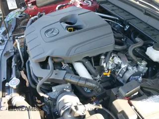 ✅ 2024 Mazda CX-30 S Premium • VIN: 3MVDMBDM0RM628115 • Lot: 40679651. Wystawiony na IAAI z przebiegiem 5 082 mil. Bezpłatny archiwum sprzedaży aukcyjnych z USA i szczegółowy raport historii pojazdu na DreamBid. Zdjęcie 19.