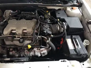 2003 Chevrolet Malibu LS z VIN 1G1NE52J93M548014, wystawiony jako Copart lot #85445814 z przebiegiem 114 160 mil mil oraz Szkoda całkowita • Salvage title. Historia ofert i sprzedaży dostępna na DreamBid. Obrazek 13.