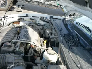 ✅ 2000 Pontiac Sunfire • VIN: 4G2JB32T6YB201539 • Лот: 42294067. Опубликован ранее на IAAI с пробегом 106 389 миль. Бесплатный доступ к архиву аукционных продаж из США и подробный отчёт об истории автомобиля на DreamBid. Изображение 19.