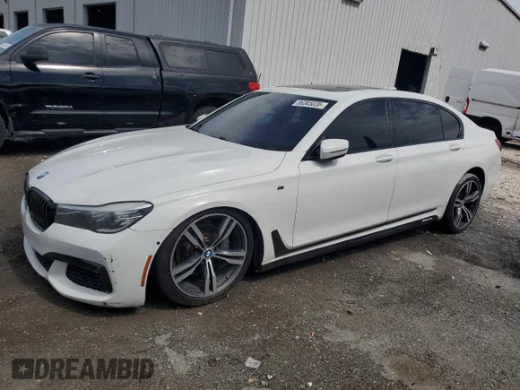 ✅ 2016 BMW 7 Series 740i • VIN: WBA7E2C55GG547122 • Лот: 56365035. Опубликован ранее на Copart с пробегом 127 297 миль. Бесплатный доступ к архиву аукционных продаж из США и подробный отчёт об истории автомобиля на DreamBid. Изображение 1.