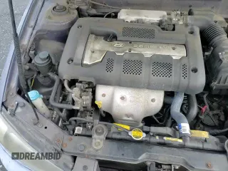 2001 Hyundai Elantra GLS z VIN KMHDN45D71U165152, wystawiony jako Copart lot #85497464 z przebiegiem 180 977 mil mil oraz Czysty tytuł • Clean title. Historia ofert i sprzedaży dostępna na DreamBid. Obrazek 13.