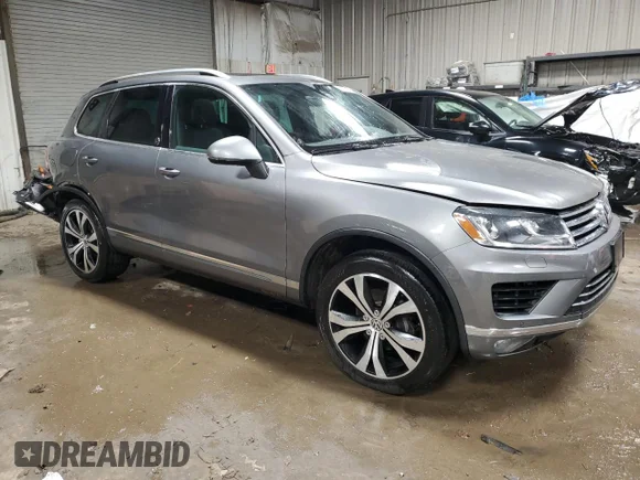 ✅ 2017 Volkswagen Touareg Wolfsburg Edition • VIN: WVGRF7BP9HD002693 • Лот: 71615172. Опубліковано раніше на Copart з пробігом 62 226 миль. Безкоштовний доступ до архіву аукціонних продажів зі США та докладний звіт про історію автомобіля на DreamBid. Зображення 4.