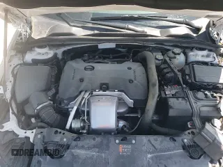 ✅ 2020 Buick Regal Avenir • VIN: W04GW6SX6L1009868 • Lot: 52039075. Listed on Copart with 70,756 mi. Free auction sales archive from the USA and detailed vehicle history report at DreamBid. Image 13.