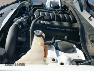 ✅ 2022 Dodge Charger Scat Pack Widebody • VIN: 2C3CDXGJ3NH105065 • Lot: 42954950. Wystawiony na IAAI z przebiegiem 18 236 mil. Bezpłatny archiwum sprzedaży aukcyjnych z USA i szczegółowy raport historii pojazdu na DreamBid. Zdjęcie 25.