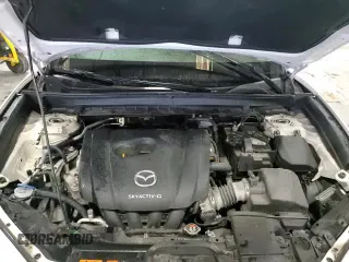 ✅ 2021 Mazda CX-30 S • VIN: 3MVDMAAL8MM231279 • Лот: 85299615. Опубликован ранее на Copart с пробегом 85 921 миль. Бесплатный доступ к архиву аукционных продаж из США и подробный отчёт об истории автомобиля на DreamBid. Изображение 14.