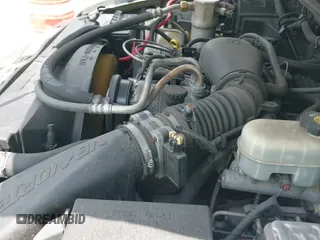 2003 Chevrolet Blazer LS z VIN 1GNCT18X23K173241, wystawiony jako IAAI lot #42410493 z przebiegiem 97 147 mil mil oraz . Historia ofert i sprzedaży dostępna na DreamBid. Obrazek 12.