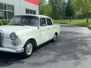 ✅ 1965 Mercedes-Benz 190 • VIN: 11001010128 • Lot: 65751995. Listed on Copart with 77,434 mi. Free auction sales archive from the USA and detailed vehicle history report at DreamBid. Image 15.