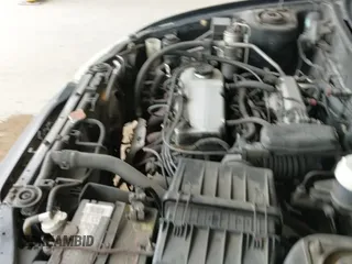 ✅ 2001 Mitsubishi Mirage DE • VIN: JA3AY11A71U051286 • Lot: 42510679. Listed on IAAI with 263,238 mi. Free auction sales archive from the USA and detailed vehicle history report at DreamBid. Image 20.