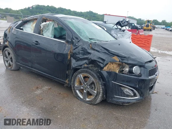 ✅ 2013 Chevrolet Sonic RS • VIN: 1G1JG6SB8D4137857 • Lot: 42236357. Listed on IAAI with 112,618 mi. Free auction sales archive from the USA and detailed vehicle history report at DreamBid. Image 1.