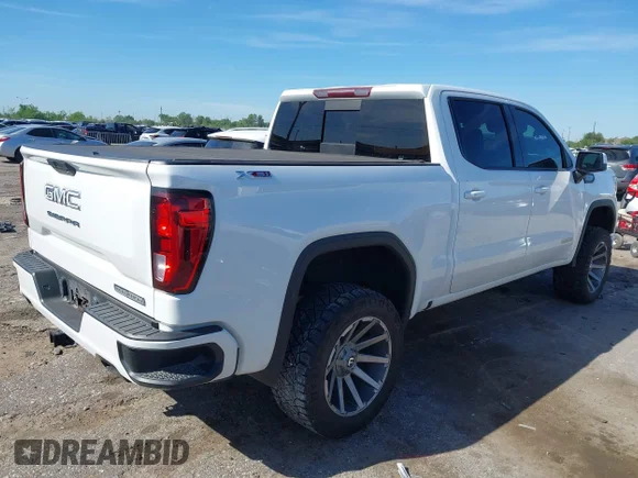 ✅ 2021 GMC Sierra 1500 Elevation • VIN: 3GTU9CED3MG202630 • Lot: 44805342. Wystawiony na IAAI z przebiegiem 74 899 mil. Bezpłatny archiwum sprzedaży aukcyjnych z USA i szczegółowy raport historii pojazdu na DreamBid. Zdjęcie 4.