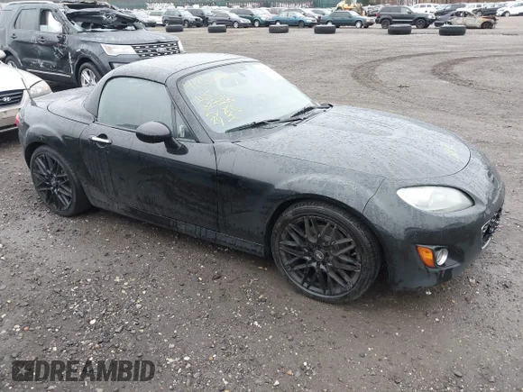 ✅ 2012 Mazda MX-5 Miata Grand Touring • VIN: JM1NC2PF5C0221097 • Lot: 41952285. Wystawiony na IAAI z przebiegiem 155 527 mil. Bezpłatny archiwum sprzedaży aukcyjnych z USA i szczegółowy raport historii pojazdu na DreamBid. Zdjęcie 1.