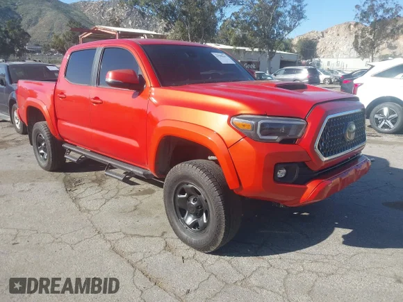 ✅ 2018 Toyota Tacoma TRD Sport • VIN: 3TMAZ5CN7JM061326 • Лот: 44298641. Опубліковано раніше на IAAI з пробігом 101 171 миль. Безкоштовний доступ до архіву аукціонних продажів зі США та докладний звіт про історію автомобіля на DreamBid. Зображення 1.