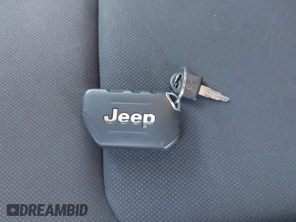 ✅ 2021 Jeep Wrangler Sport • VIN: 1C4GJXAG9MW791518 • Lot: 44762419. Wystawiony na IAAI z przebiegiem 63 492 mil. Bezpłatny archiwum sprzedaży aukcyjnych z USA i szczegółowy raport historii pojazdu na DreamBid. Zdjęcie 11.