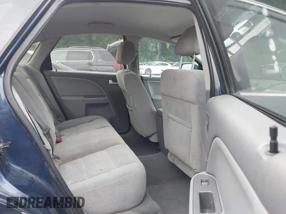 ✅ 2005 Ford Five Hundred SE • VIN: 1FAFP23115G151505 • Lot: 42408037. Wystawiony na IAAI z przebiegiem 251 537 mil. Bezpłatny archiwum sprzedaży aukcyjnych z USA i szczegółowy raport historii pojazdu na DreamBid. Zdjęcie 8.
