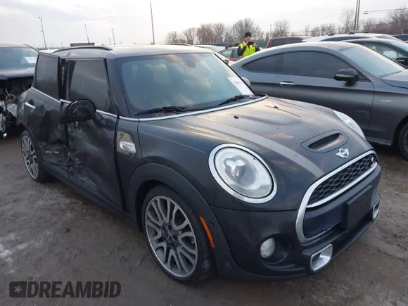 ✅ 2018 MINI Hardtop 4 Door Cooper S • VIN: WMWXU3C5XJ2F49951 • Lot: 44042350. Wystawiony na IAAI z przebiegiem 62 294 mil. Bezpłatny archiwum sprzedaży aukcyjnych z USA i szczegółowy raport historii pojazdu na DreamBid. Zdjęcie 1.