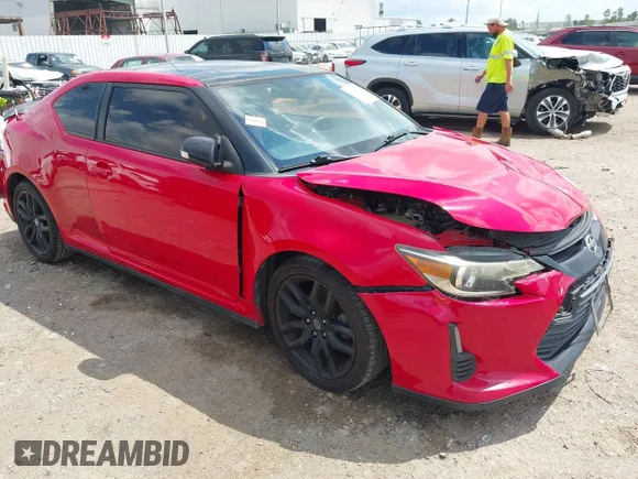 ✅ 2015 Scion tC • VIN: JTKJF5C7XFJ011771 • Lot: 43069003. Listed on IAAI with 128,246 mi. Free auction sales archive from the USA and detailed vehicle history report at DreamBid. Image 1.