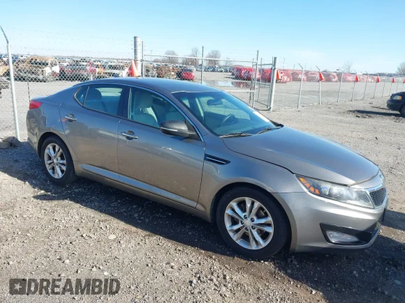 ✅ 2013 Kia Optima LX • VIN: 5XXGM4A70DG181871 • Лот: 44134961. Опубліковано раніше на IAAI з пробігом 145 378 миль. Безкоштовний доступ до архіву аукціонних продажів зі США та докладний звіт про історію автомобіля на DreamBid. Зображення 1.