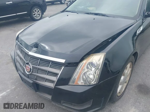 ✅ 2008 Cadillac CTS AWD • VIN: 1G6DT57V080176827 • Lot: 45330392. Wystawiony na IAAI z przebiegiem 174 894 mil. Bezpłatny archiwum sprzedaży aukcyjnych z USA i szczegółowy raport historii pojazdu na DreamBid. Zdjęcie 6.