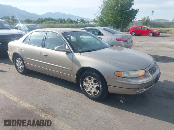 ✅ 2002 Buick Regal LS • VIN: 2G4WB52K021188022 • Лот: 45093744. Опубликован ранее на IAAI с пробегом 292 614 миль. Бесплатный доступ к архиву аукционных продаж из США и подробный отчёт об истории автомобиля на DreamBid. Изображение 1.