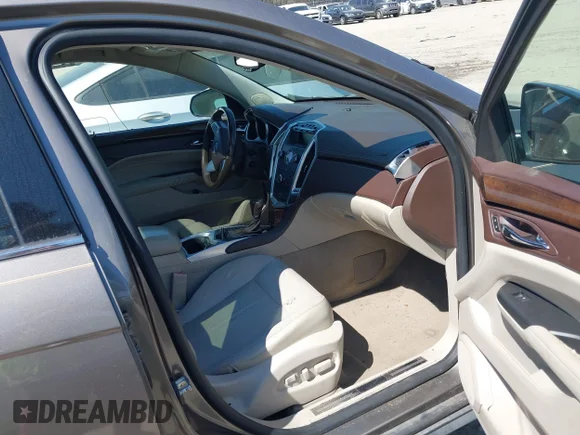 ✅ 2012 Cadillac SRX Luxury Collection • VIN: 3GYFNAE36CS509456 • Lot: 41833647. Wystawiony na IAAI z przebiegiem 119 931 mil. Bezpłatny archiwum sprzedaży aukcyjnych z USA i szczegółowy raport historii pojazdu na DreamBid. Zdjęcie 5.