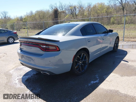 ✅ 2022 Dodge Charger SXT • VIN: 2C3CDXBG1NH209291 • Lot: 44599692. Wystawiony na IAAI z przebiegiem 81 112 mil. Bezpłatny archiwum sprzedaży aukcyjnych z USA i szczegółowy raport historii pojazdu na DreamBid. Zdjęcie 4.