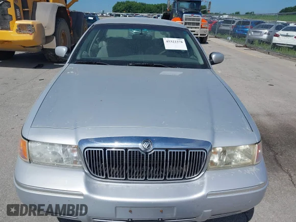 ✅ 2001 Mercury Grand Marquis LS • VIN: 2MEFM75W91X609478 • Lot: 45322378. Wystawiony na IAAI z przebiegiem 140 184 mil. Bezpłatny archiwum sprzedaży aukcyjnych z USA i szczegółowy raport historii pojazdu na DreamBid. Zdjęcie 6.