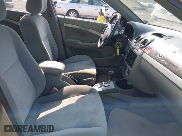 ✅ 2005 Suzuki Forenza • VIN: KL5JJ86Z85K136920 • Lot: 42647385. Wystawiony na IAAI z przebiegiem 90 213 mil. Bezpłatny archiwum sprzedaży aukcyjnych z USA i szczegółowy raport historii pojazdu na DreamBid. Zdjęcie 5.
