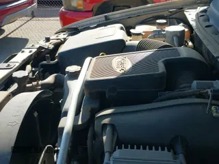 ✅ 2005 GMC Envoy SLE • VIN: 1GKDT13S452208782 • Lot: 42701756. Listed on IAAI with 164,734 mi. Free auction sales archive from the USA and detailed vehicle history report at DreamBid. Image 12.