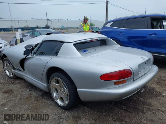 ✅ 1998 Dodge Viper • VIN: 1B3ER65E4WV401163 • Lot: 42477643. Listed on IAAI with 29,173 mi. Free auction sales archive from the USA and detailed vehicle history report at DreamBid. Image 3.