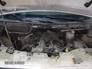 ✅ 2021 Ford Transit Cargo • VIN: 1FTBR2CG2MKA40366 • Lot: 48967855. Wystawiony na Copart z przebiegiem 81 030 mil. Bezpłatny archiwum sprzedaży aukcyjnych z USA i szczegółowy raport historii pojazdu na DreamBid. Zdjęcie 14.