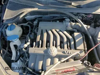 ✅ 2012 Volkswagen Passat SEL Premium • VIN: 1VWCM7A31CC099575 • Lot: 84479974. Wystawiony na Copart z przebiegiem 137 027 mil. Bezpłatny archiwum sprzedaży aukcyjnych z USA i szczegółowy raport historii pojazdu na DreamBid. Zdjęcie 13.