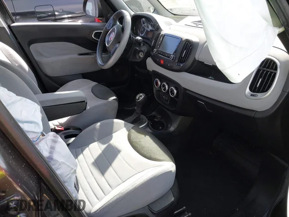 ✅ 2014 FIAT 500L Easy • VIN: ZFBCFABH0EZ024888 • Лот: 43518713. Опубликован ранее на IAAI с пробегом 129 549 миль. Бесплатный доступ к архиву аукционных продаж из США и подробный отчёт об истории автомобиля на DreamBid. Изображение 5.