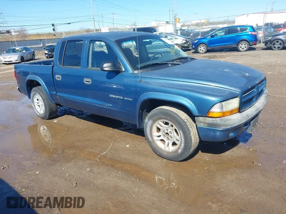 ✅ 2002 Dodge Dakota Sport • VIN: 1B7HL38X42S544277 • Lot: 44575099. Wystawiony na IAAI z przebiegiem 239 365 mil. Bezpłatny archiwum sprzedaży aukcyjnych z USA i szczegółowy raport historii pojazdu na DreamBid. Zdjęcie 1.