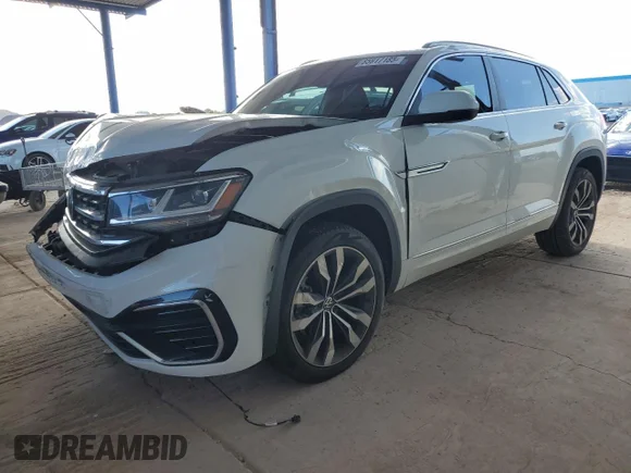 ✅ 2021 Volkswagen Atlas SEL • VIN: 1V2SE2CA0MC233664 • Lot: 85917185. Listed on Copart with 59,569 mi. Free auction sales archive from the USA and detailed vehicle history report at DreamBid. Image 1.