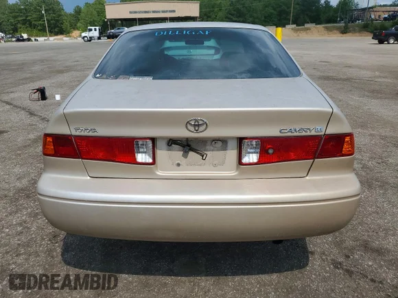 ✅ 2000 Toyota Camry LE • VIN: 4T1BG28K3YU985500 • Lot: 56797256. Listed on Copart with 286,206 mi. Free auction sales archive from the USA and detailed vehicle history report at DreamBid. Image 6.