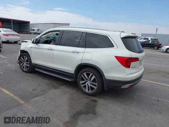 ✅ 2016 Honda Pilot Touring • VIN: 5FNYF5H98GB018985 • Lot: 44690263. Listed on IAAI with 215,288 mi. Free auction sales archive from the USA and detailed vehicle history report at DreamBid. Image 3.